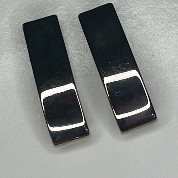 Express silver tone bar clip on earrings. - Picture 1 of 4